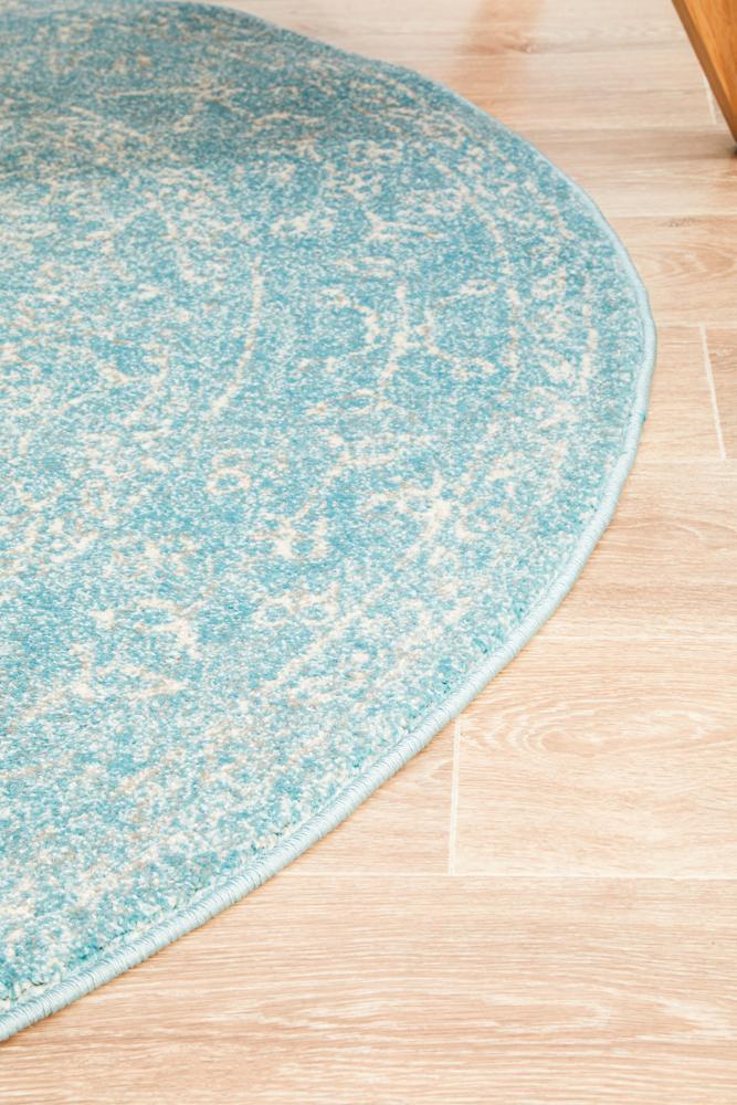 Avery Transitional Light Blue Faded Round Rug