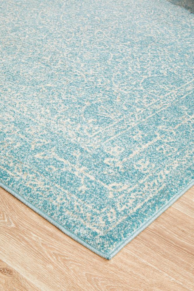 Avery Transitional Light Blue Faded Rug